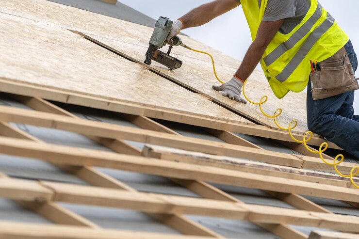 building-construction-process-new-wooden-roof-wood-frame-house_754108-3330